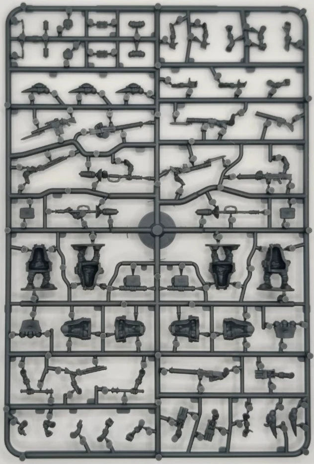 Plastic model kit parts on a gray background