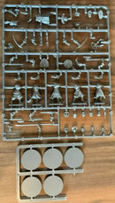 Model kit parts on a wooden surface