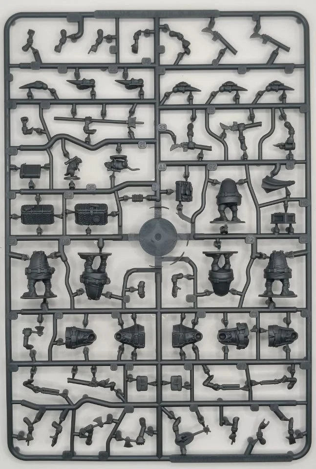 Plastic model kit parts on a gray background