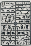 Plastic model kit tray with various small figures and objects on a white background