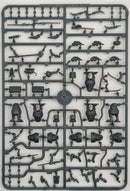 Model kit tray with various small mechanical parts on a white background