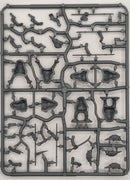 Plastic model kit component tray with various small figures and parts on a white background